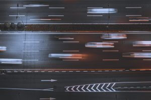 Time-lapse Photo Of Cars In Asphalt Road